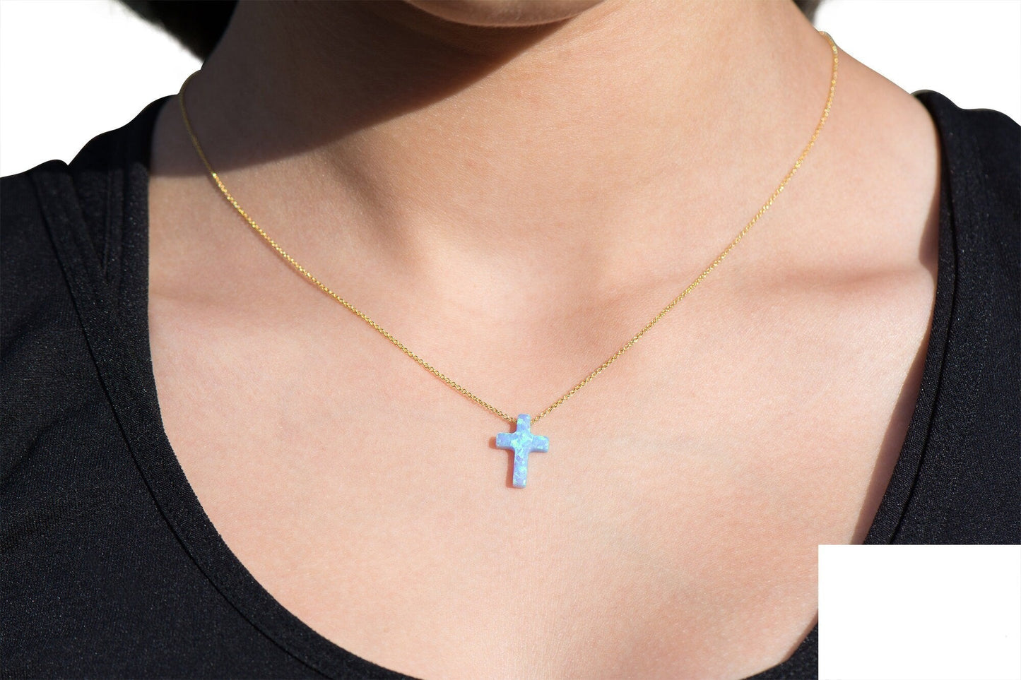 Opal Cross Necklace floating on 14k Gold Chain