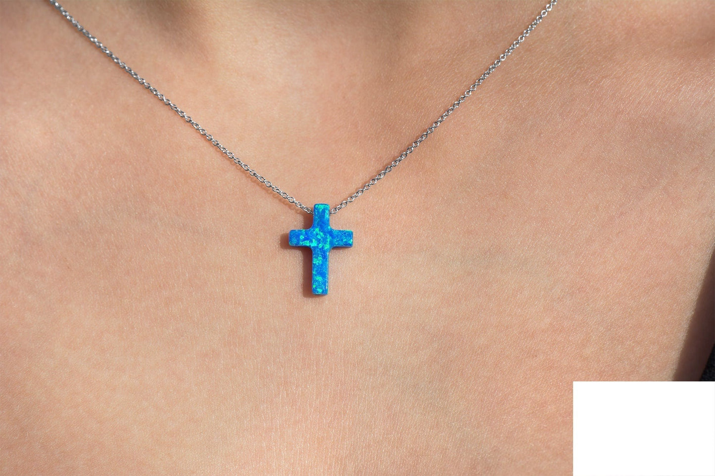 Opal Cross Necklace floating on 14k Gold Chain