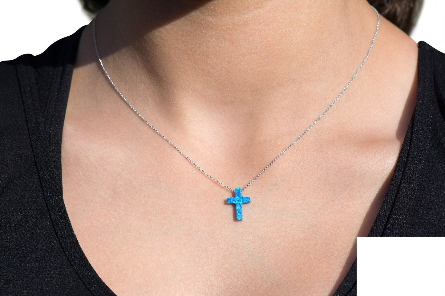 Opal Cross Necklace floating on 14k Gold Chain