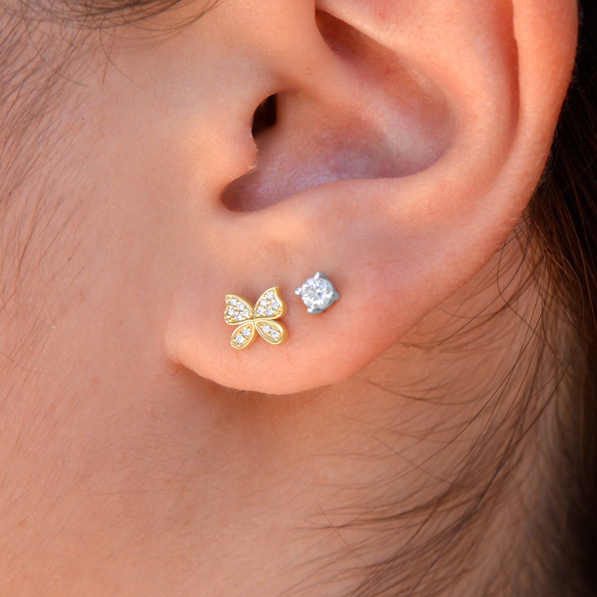 14k diamond butterfly stud earrings on ear model