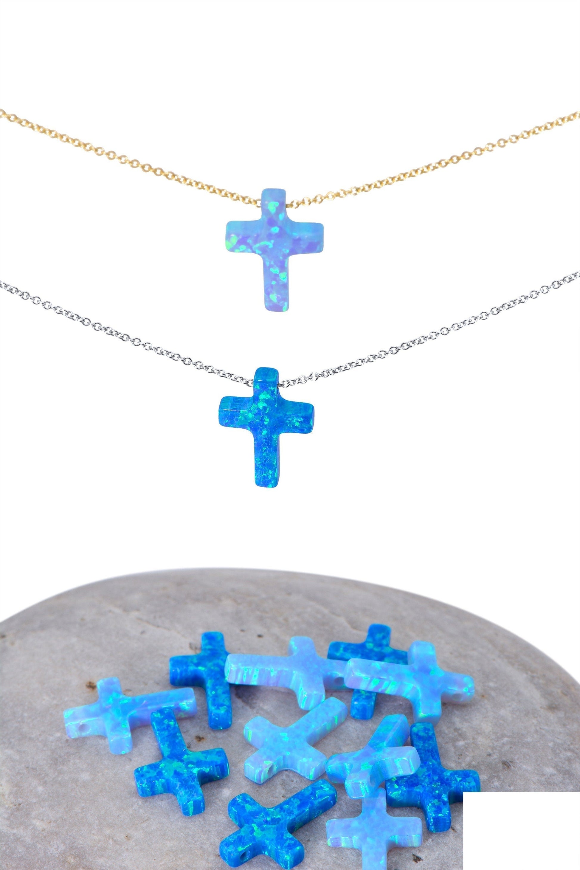 Opal Cross Necklace floating on 14k Gold Chain